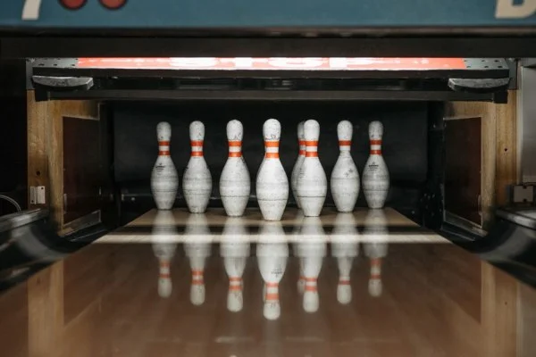bowling ball hitting pins